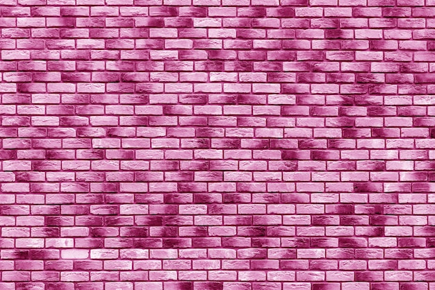 Foto parede de tijolos rosa. design de interiores do loft. fundo arquitetônico.