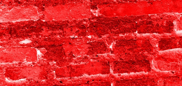Parede de tijolos vermelhos com fundo vermelho