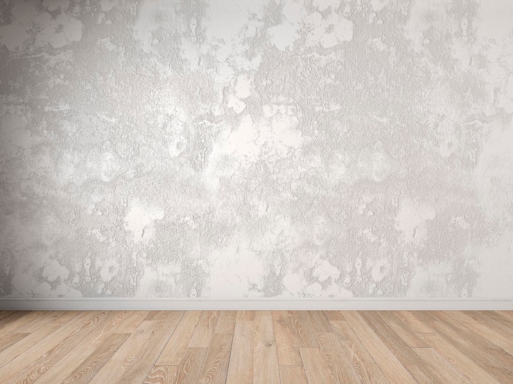 Foto parede em branco com gesso estuque cor bege moldagem e piso de madeira