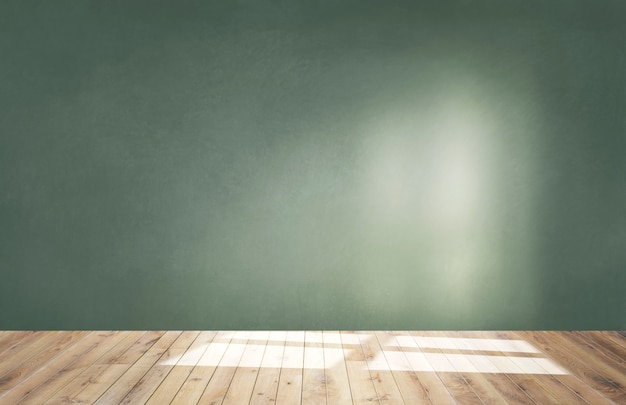 Parede verde em uma sala vazia com chão de madeira