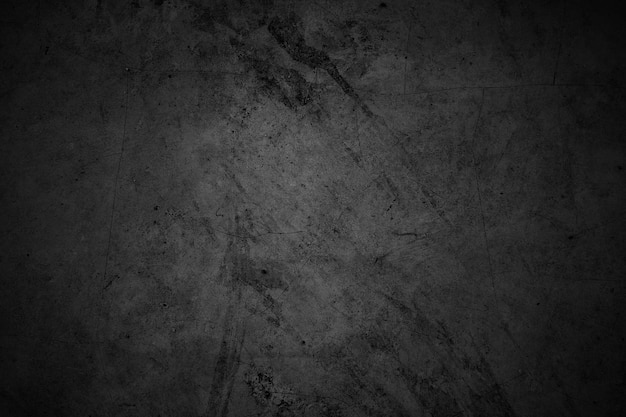 Paredes agrietadas, suelo de hormigón de hormigón gris oscuro envejecido en un concepto retro Textura de un muro de hormigón negro sucio como fondo