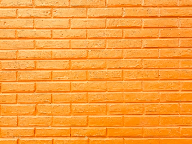 Foto paredes de bloco de tijolo amarelo, fundo abstrato textura de cimento amarelo