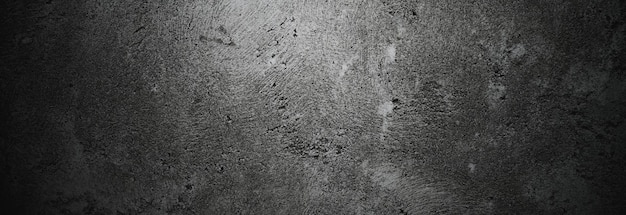 Paredes escuras assustadoras, textura de cimento de concreto preto levemente leve para o fundo Escove arranhões na parede