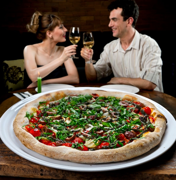 Pareja, en, pizzería