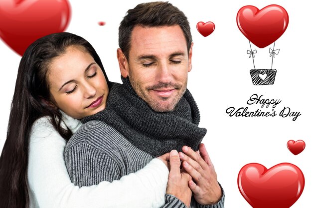 Foto pareja sonriente abrazando los ojos cerrados contra el lindo mensaje de san valentín