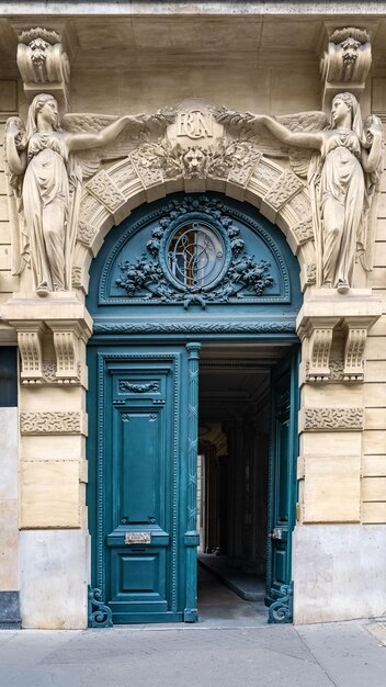 Foto parís una puerta antigua hermosa fachada