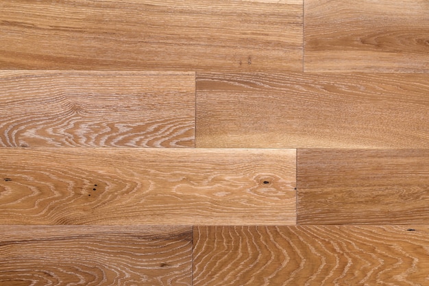Parquet de madeira marrom claro com textura de painéis