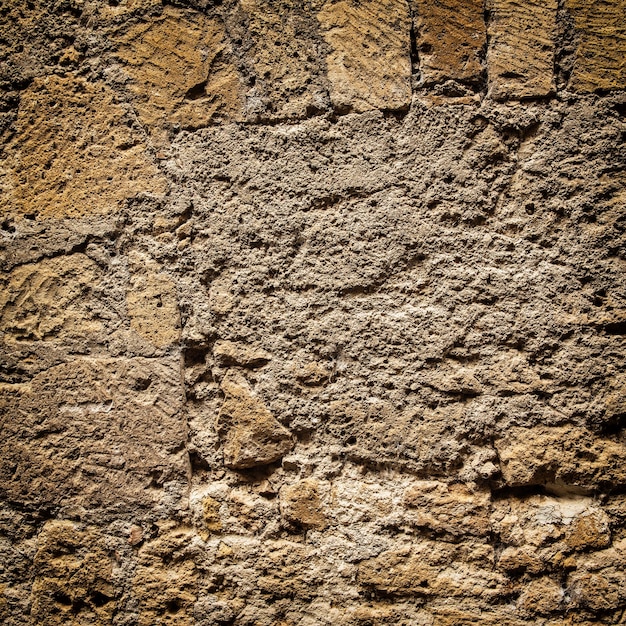 Parte de la antigua pared de ladrillo antiguo con fondo de textura de viñeta