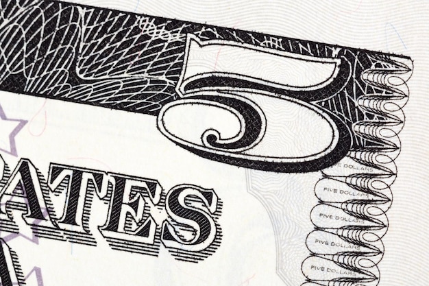 Parte da foto de alta resolução da nota de cinco dólares dos EUA