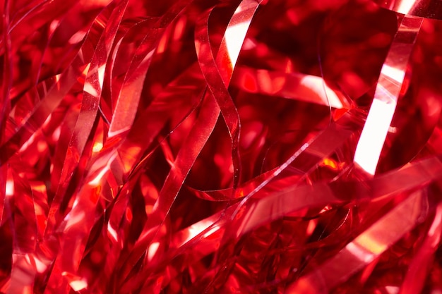 Foto parte vermelho tinsel fundo de férias caixa de presente enchimento decorativo fundo colorido para design