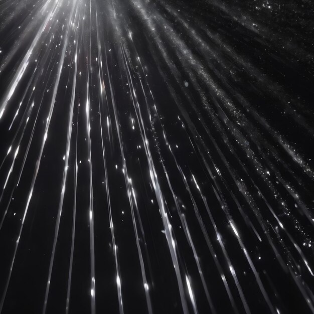 Foto partículas blancas en un fondo negro en los rayos de luz