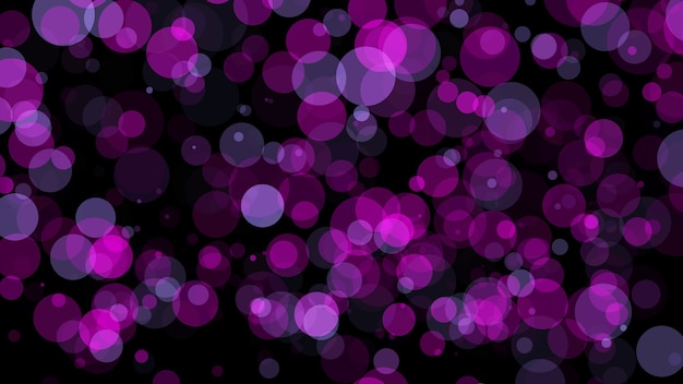 partículas rosadas borrosas sobre fondo negro