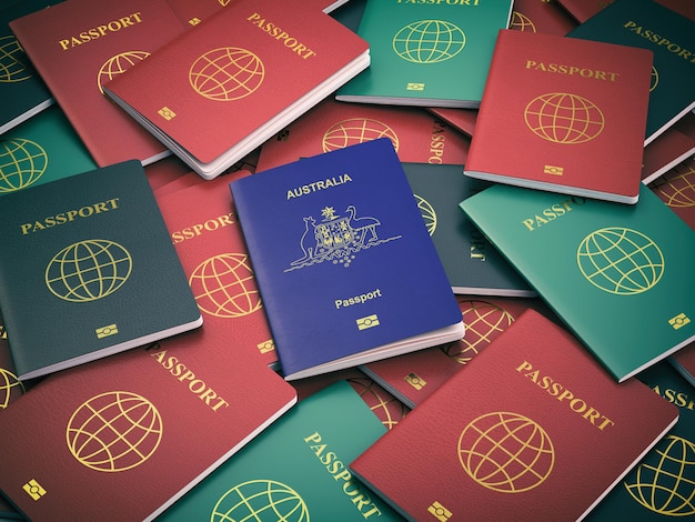 Pasaporte de Australia en la pila de diferentes pasaportes Concepto de inmigración Pasaporte australiano