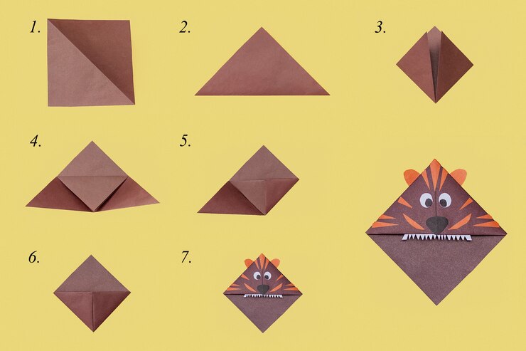 Foto pasos para hacer el símbolo de marcador de origami del tigre de año nuevo 2022. concepto de bricolaje.