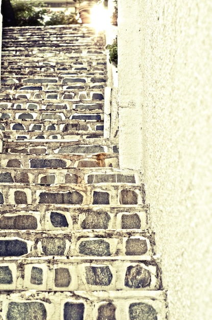 Foto pasos por la pared en la ciudad