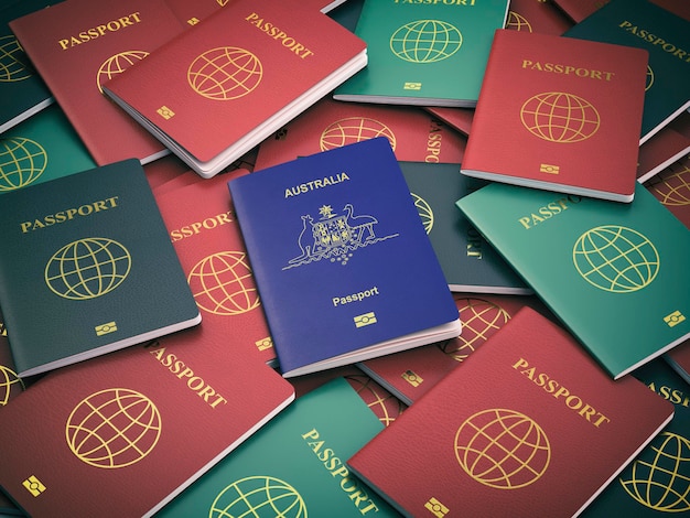 Passaporte da Austrália na pilha de passaportes diferentes Conceito de imigração Passaporte australiano