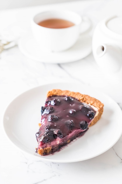 pastel de arándanos con té