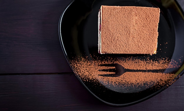 Pastel de pastel con cerezas cacao y crema Vista superior del espacio de copia