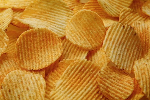 Patatas Fritas Corrugadas. Fondo de textura de alimentos. Vista superior.