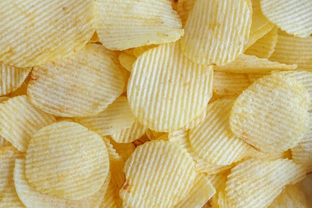 Patatas fritas crujientes snack textura del fondo