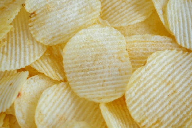 Patatas fritas crujientes snack textura del fondo