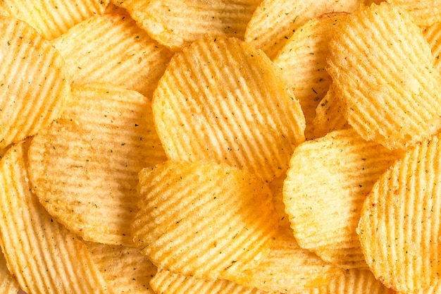 Foto patatas fritas textura del fondo. patrón de papas