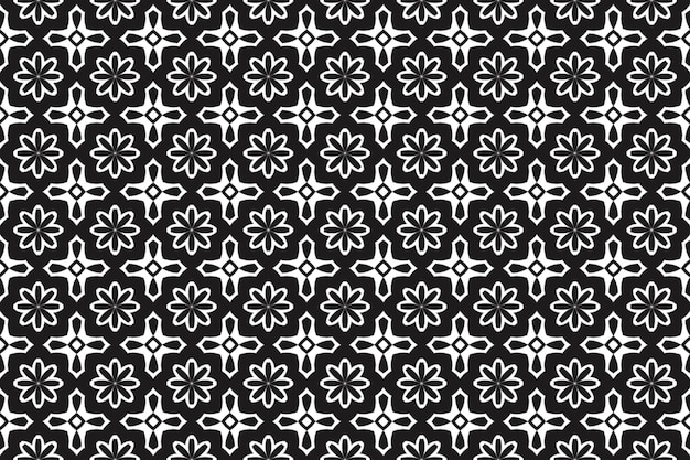 un patrón blanco y negro con un diseño floral en un fondo negro