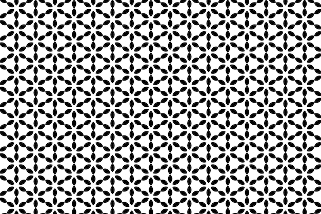 Patrón blanco y negro con un motivo geométrico.