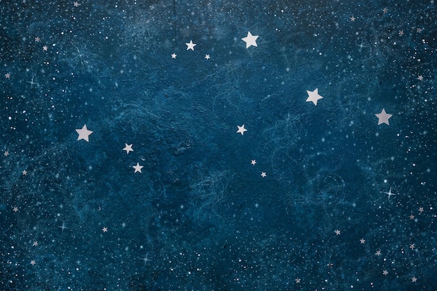 Patrón celeste astronómico Constelación Acuario de confeti plateado en forma de estrella en el fondo azulx9