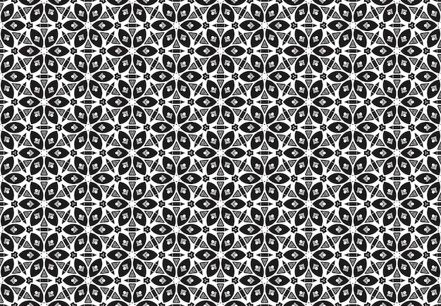 el patrón sin costuras abstracto en blanco y negro con la imagen de un ornamento geométrico