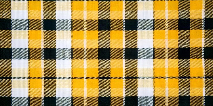 Patrón de cuadrícula sin costuras en tonos apagados en tela Perfecto para textiles, moda y decoración de interiores