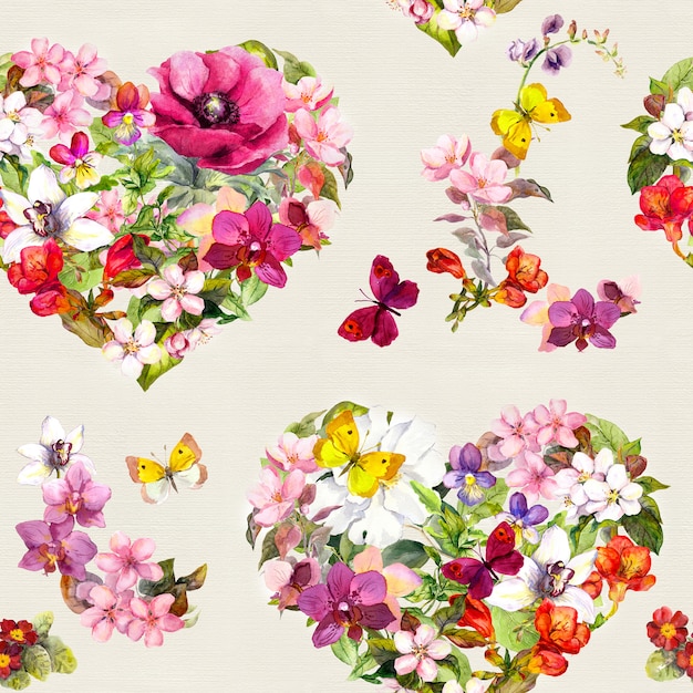 Patrón sin fisuras - corazones ditsy florales con flores, mariposas de pradera, hierba salvaje. Acuarela