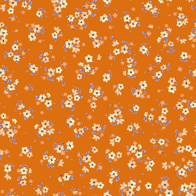 El patrón floral Ditsy en el fondo naranja