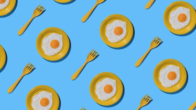 Un patrón de huevos fritos en un plato amarillo y tenedores amarillos sobre un fondo azul Concepto mínimo
