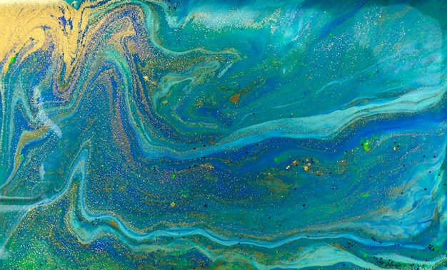 Patrón de mármol líquido de fondo abstracto azul jaspeado con polvo de oro