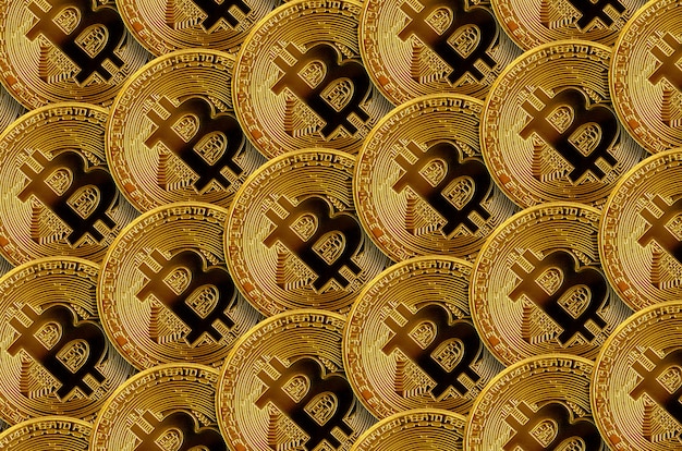 Foto patrón de muchos bitcoins dorados. concepto de minería de criptomonedas