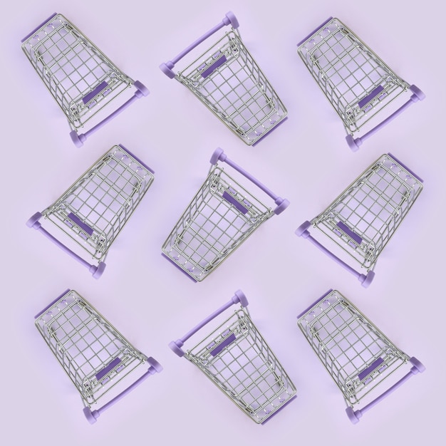 Patrón de muchos pequeños carritos de compras en una violeta