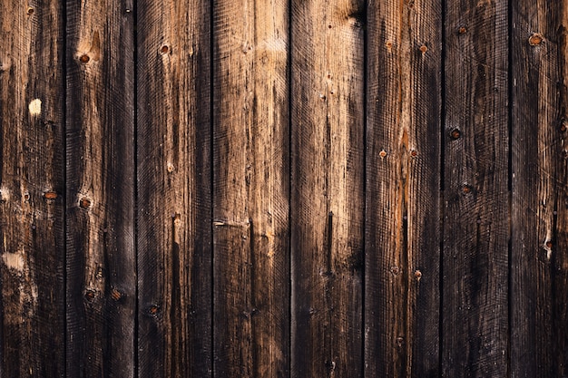 Patrón natural de madera oscura, viejo fondo de tablas negras. Espacio de diseño. Resumen telón de fondo de madera, textura. Elemento interior Tableros ásperos del grunge, pared de madera decorativa.