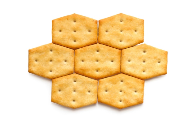 El patrón de nido de miel de galletas sobre un fondo blanco