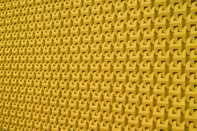 Patrón de la pared exterior del edificio moderno en fondo de color amarillo mostaza