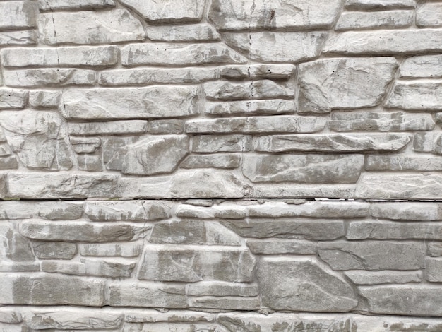 Patrón de pared de ladrillo antiguo fondo de piedras