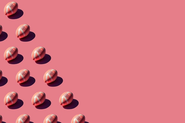 Patrón de pelotas de rugby de fútbol americano rosa con sombra dura en el lado izquierdo sobre fondo rosa Concepto de competición deportiva ganar liga de campeones Imagen creada con inteligencia artificial