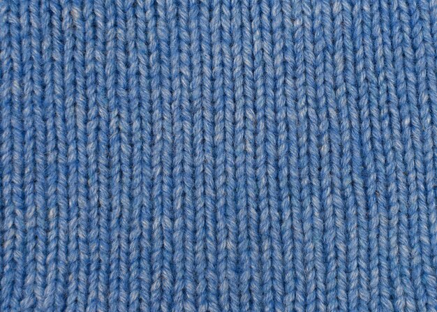 Patrón de punto como fondo Textura de tejido de punto azul Tejido a mano