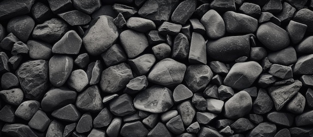 Patrón de roca en blanco y negro sobre un fondo de piedra gris texturizado con amplio espacio para el diseño