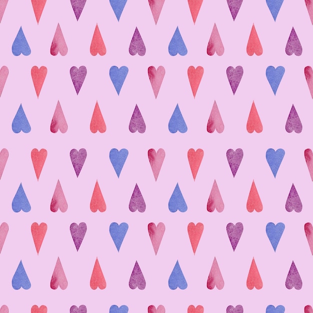 Patrón romántico de corazones en suave rosa rojo lavanda y azul claro La técnica de acuarela agrega un suave toque tierno para el ambiente amoroso para tarjetas de San Valentín regalos y decoraciones