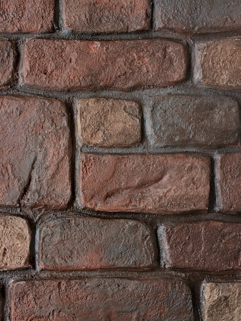 Patrón de textura de un antiguo muro de piedra de ladrillo rojo