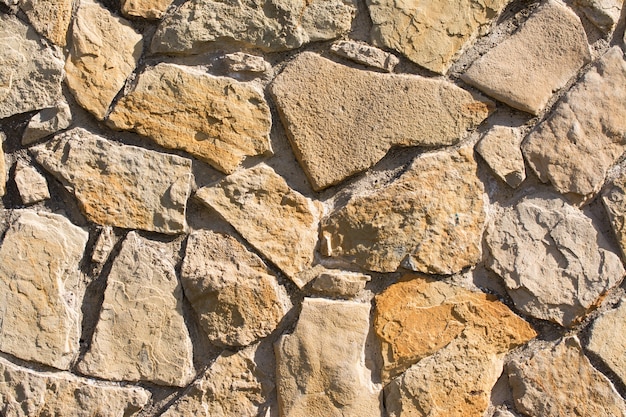Patrón de textura de pared de piedras astilladas y