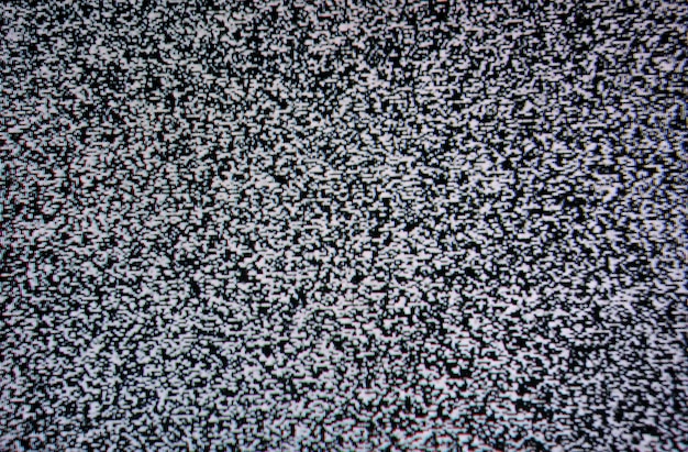 Patrón de textura de ruido de pantalla de TV blanco y negro