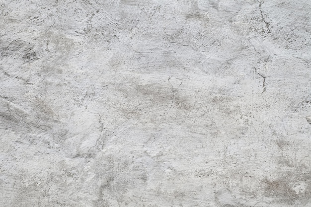 Patrón de textura uniforme de papel tapiz de fondo de superficie gris enlucida áspera