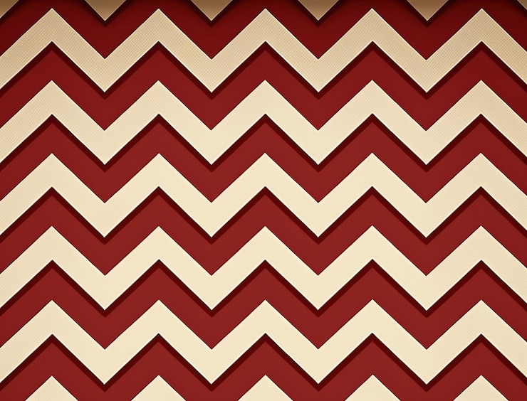 Foto un patrón en zigzag con un fondo rojo.